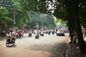 Power cables parallel to this crowded streert in Hanoi...